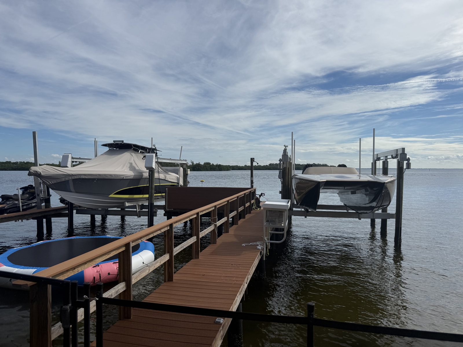 Existing boat docks and lifts before the new roof